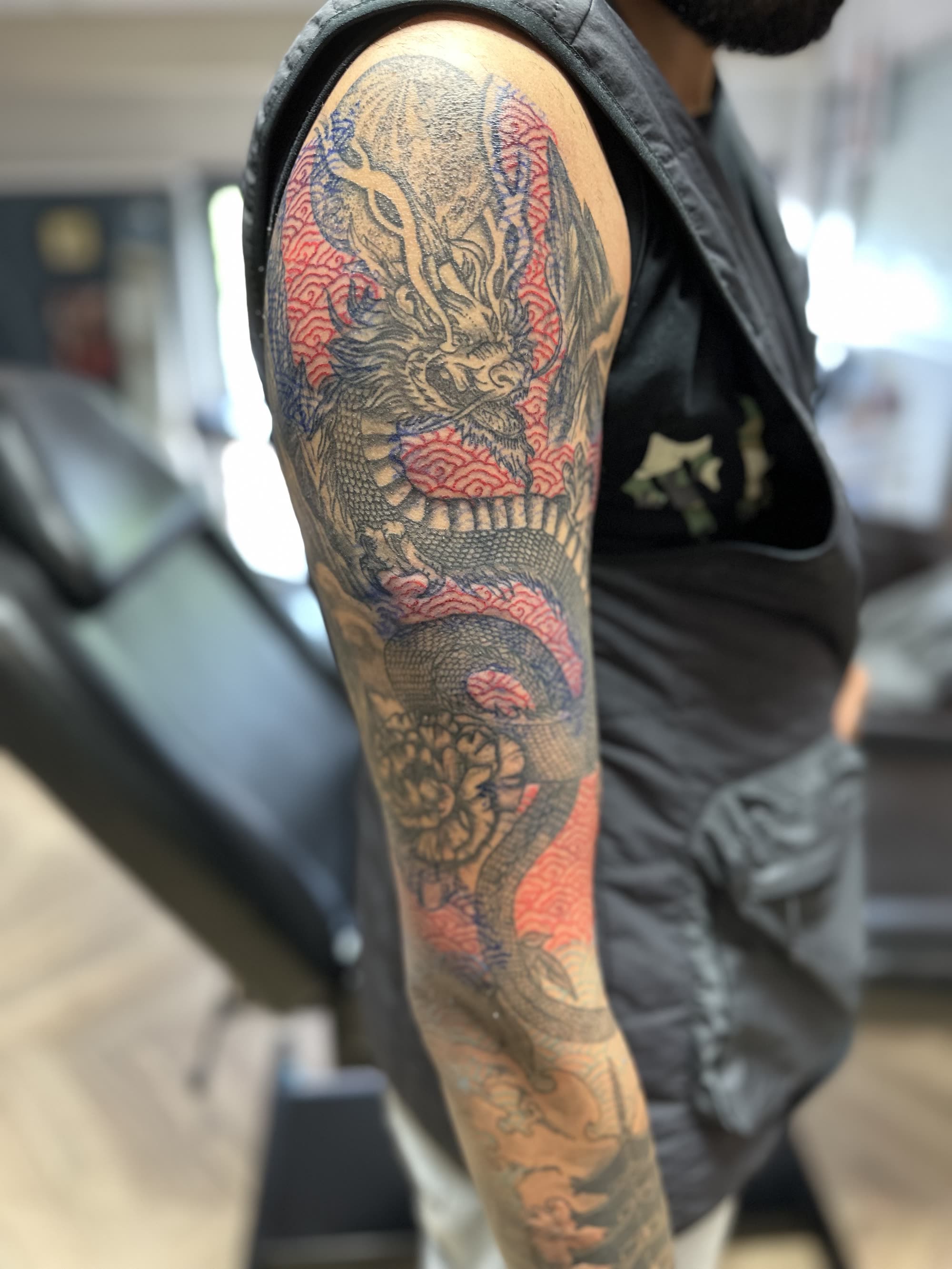 Full sleeve — dragon with red seigaiha waves